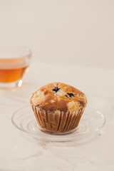 Breakfast with fresh homemade delicious muffins and tea.