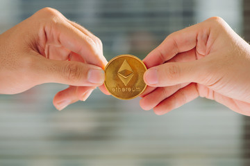 uncertainty with bitcoin in hand,war of bitcoin,pull bitcoin with hand to hand, many bitcoins up,on...