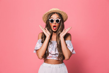Portrait of an excited young girl in summer clothes
