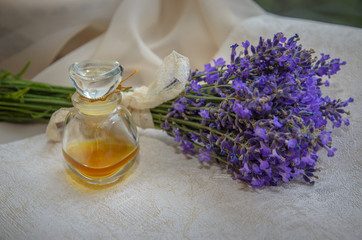 Obraz na płótnie Canvas Vintage composition with lavender and perfume bottle