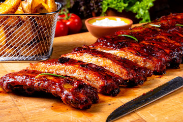 BBQ spare ribs from a charcoal grill
