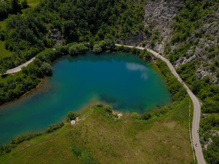 Fototapeta na wymiar The Gornjepolje Spring (Gornjepoljski Vir) is a huge karst spring in the Central Montenegro. It is a natural phenomenon called an estavelle, as spring becomes sinkhole / ponor during low waters.
