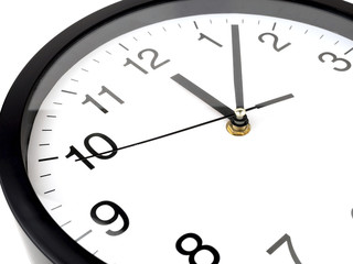 Fototapeta na wymiar Clock or time abstract background, white clock and black needles, Twelve o'clock, seven minutes