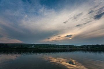 Obraz premium sunset in the river
