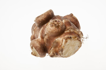 Jersalem Artichoke (Helianthus tuberosus) vegetable isolated on a white studio background.