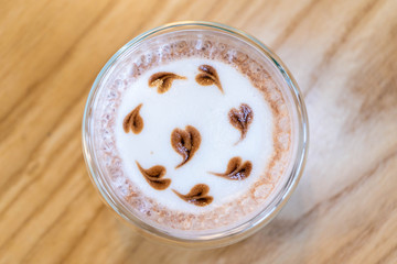 A glass of chocolate with mini heart shape