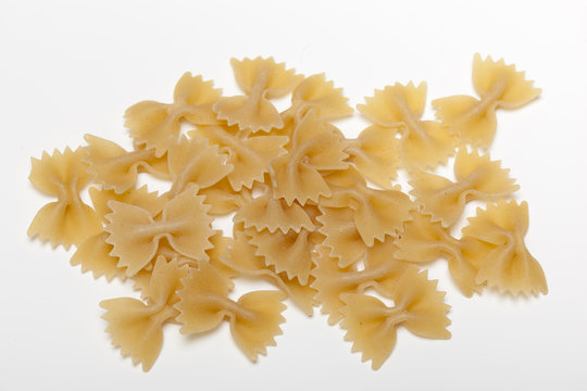 Pile of pasta farfale on white