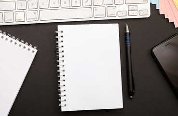 Top view with copy space of an office table with business objects for a work