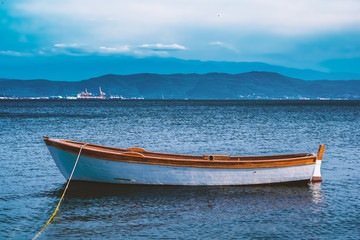 Fototapeta premium Old Wooden fishing boat with white hull