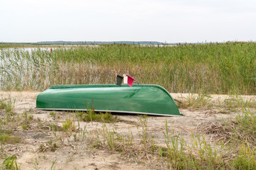 Fishing boat turned upside down