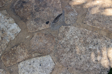 Stone texture background of stones of different shapes and sizes