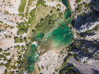 Zrmanja River in northern Dalmatia, Croatia is famous for its crystal clear waters and countless waterfalls surrounded by a deep canyon.