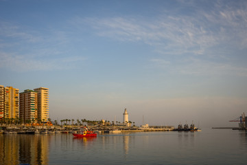 Naklejka premium Spain, Malaga, a large ship in a body of water