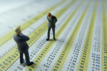 Executive businessman being reprimand by superior for bad financial result.