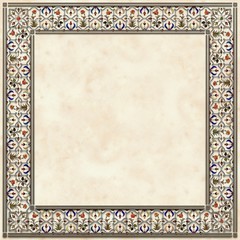 Card with ornate floral frame, old indian style, marble surface