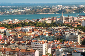 Naklejka na ściany i meble Panoramic view of Lisbon colorful rooftop from Amoreiras viewpoint towards River Tagus