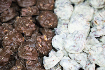 Cookie with chocolate and nuts in the shop.