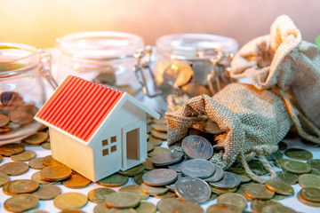 Property or real estate investment. Home mortgage loan rate. Saving money for future concept. House...
