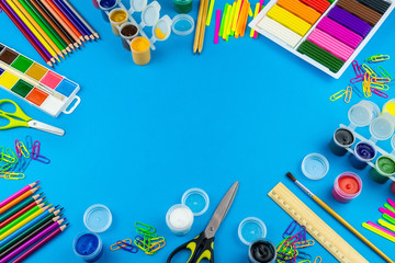 School supplies on a blue background