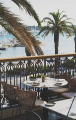 Served table for four persons in restaurant at summer.