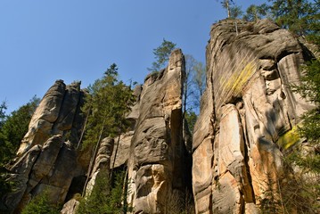 A group of high rocks under blue sky