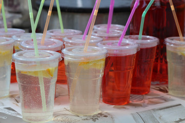 Fresh colorful lemonade in glasses. Beautiful Summer day