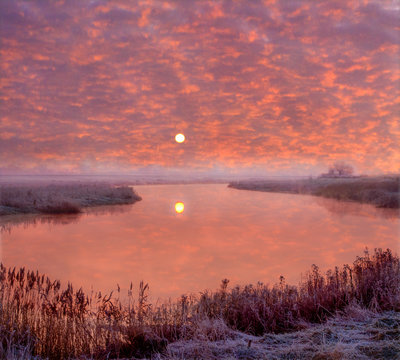 Firy Sunrise over tte River