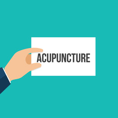 Man showing paper ACUPUNCTURE text