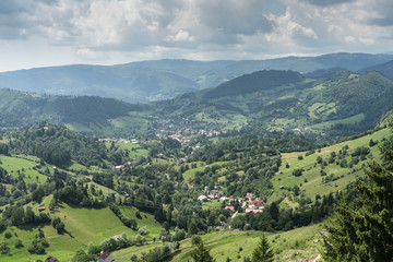 Mountain landscape and villages on the Rucar Bran corridor, in Transylvania, Romania