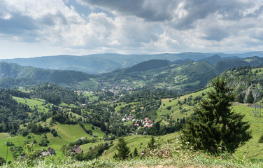 Naklejka na ściany i meble Mountain landscape and villages on the Rucar Bran corridor, in Transylvania, Romania