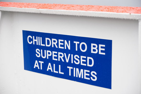 Children to be supervised at all times blue sign on white background