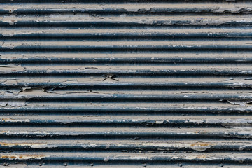 Background of rusty metal with irradiated paint 