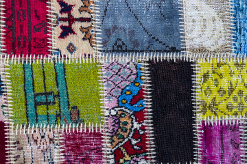 Texture of a piece of old carpet to sew thick threads 