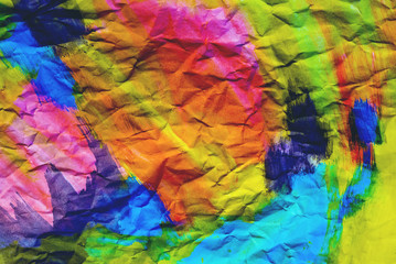 Background of colored crumpled paper shot close-up 