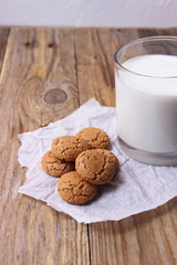 Italian biscuits amaretti with a glass of milk
