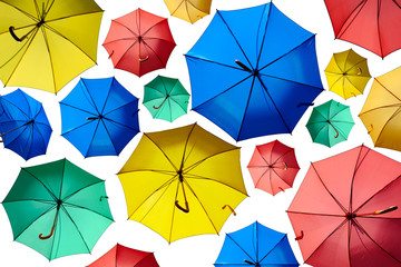 Colorful umbrellas isolated on a white background. © Nickolay Khoroshkov