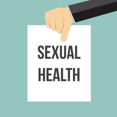 Man showing paper SEXUAL HEALTH text
