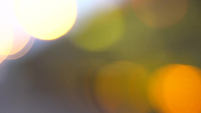 Defocused yellow circles light effects, abstract blurred motion boche background