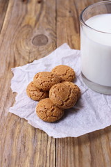 Italian biscuits amaretti with a glass of milk