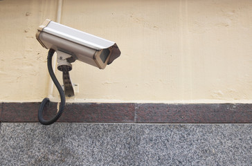 cctv camera protect crime on wall house
