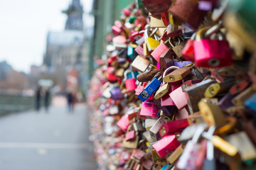 Obraz premium Bridge View Cologne where people express their love padlocks hanging on the fences of protection.