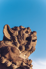 Stone lion in chinese temple