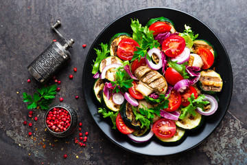 Salad with fresh and grilled vegetables and mushrooms. Vegetable salad with grilled champignons....