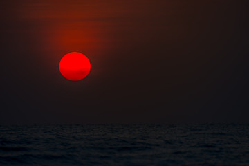 Beautiful  Red Sunrise above the sea background