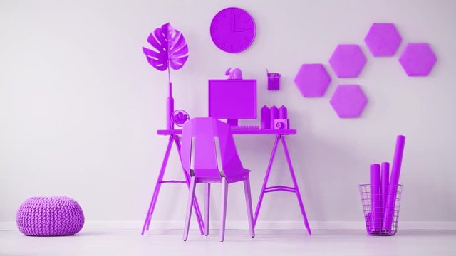 Video of purple home office interior cinemagraph with a toy dice thrown across the room. Chair at a desk with desktop computer