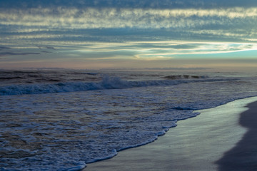 Florida white sand beach sunset after storm long exposure