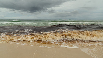 Fototapeta na wymiar Stormy sea waves crashing on Florida beach