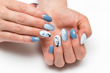 summer blue manicure with sequins on long oval nails with painted ant
