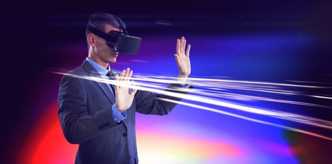 Businessman using virtual reality headset