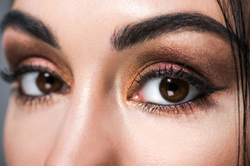 Fototapeta premium close up of beautiful female eyes with makeup